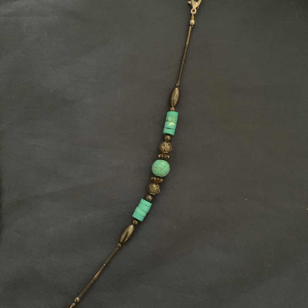 Woman’s turquoise bracelet